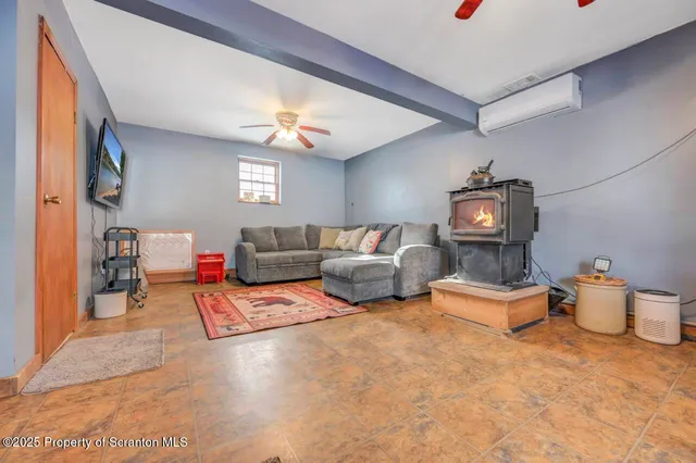 a bedroom with a bed and a lamp