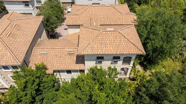an aerial view of a house with balcony
