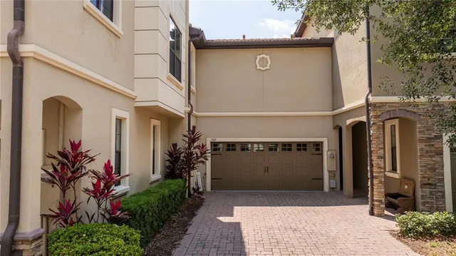 a view of a house with a garage