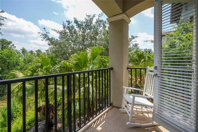 a view of a garden from a balcony
