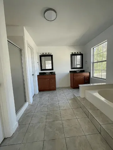 a house view with a backyard