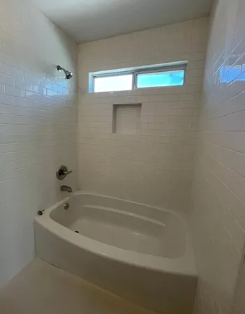 a bathroom with a bathtub