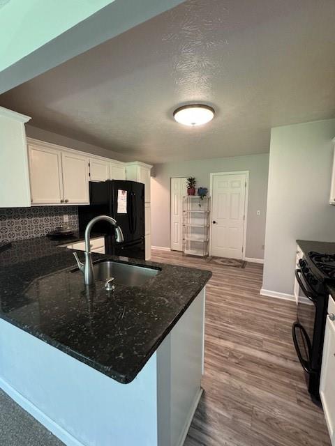 1003 Rural Ridge Drive Cheswick, PA 15024 - Photo 11 of 30 a kitchen with stainless steel appliances granite countertop a sink stove and cabinets