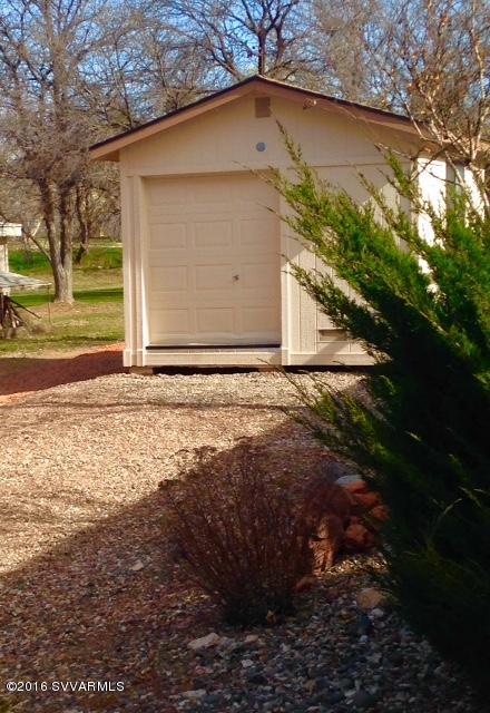 3749 East Beaver Vista Road Rimrock, AZ 86335 - Photo 20 of 26 a white house with tree in the background
