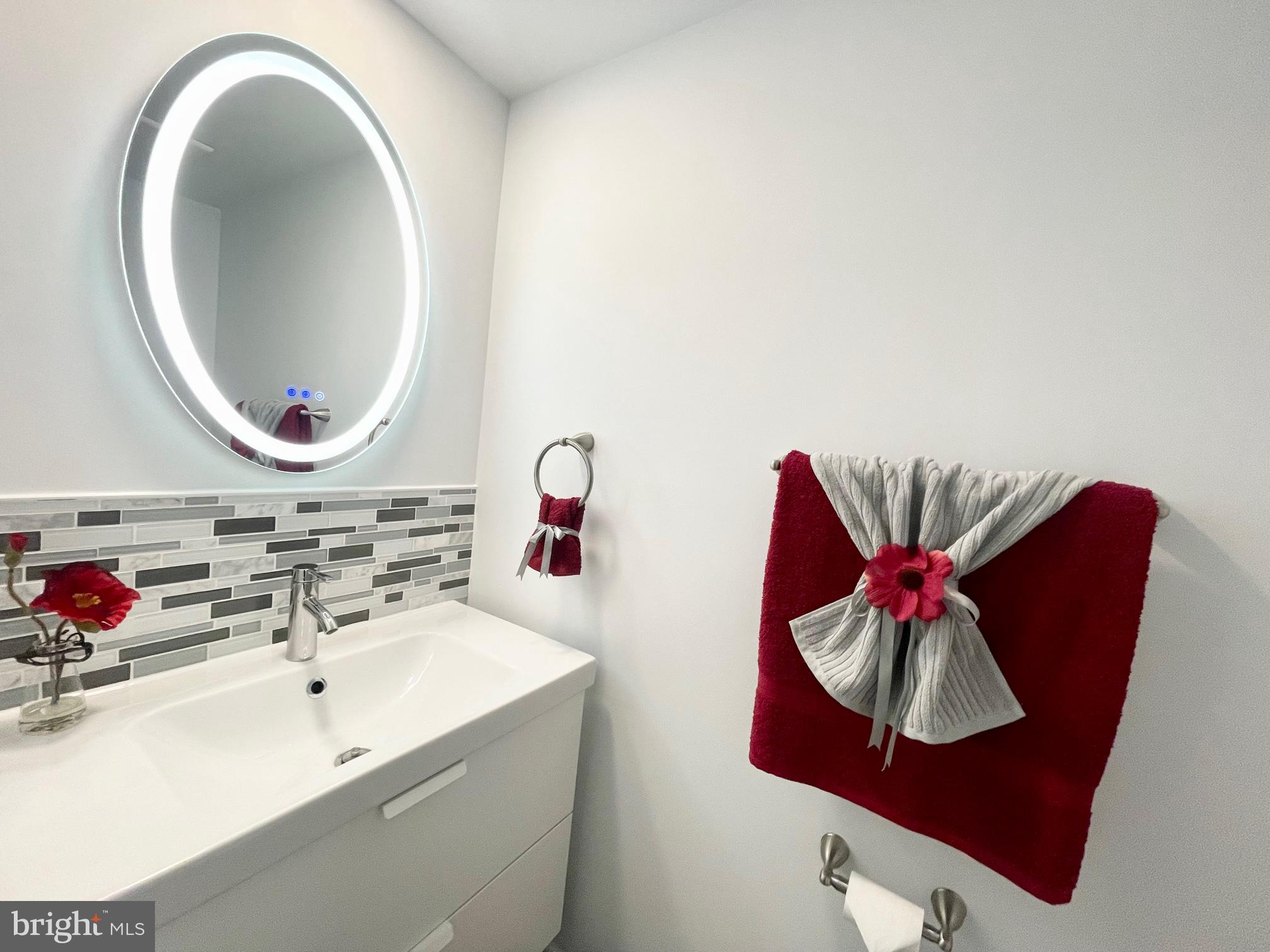 8600 Aqueduct Road Potomac, MD 20854 - Photo 23 of 66 Powder Room with Smart Mirror