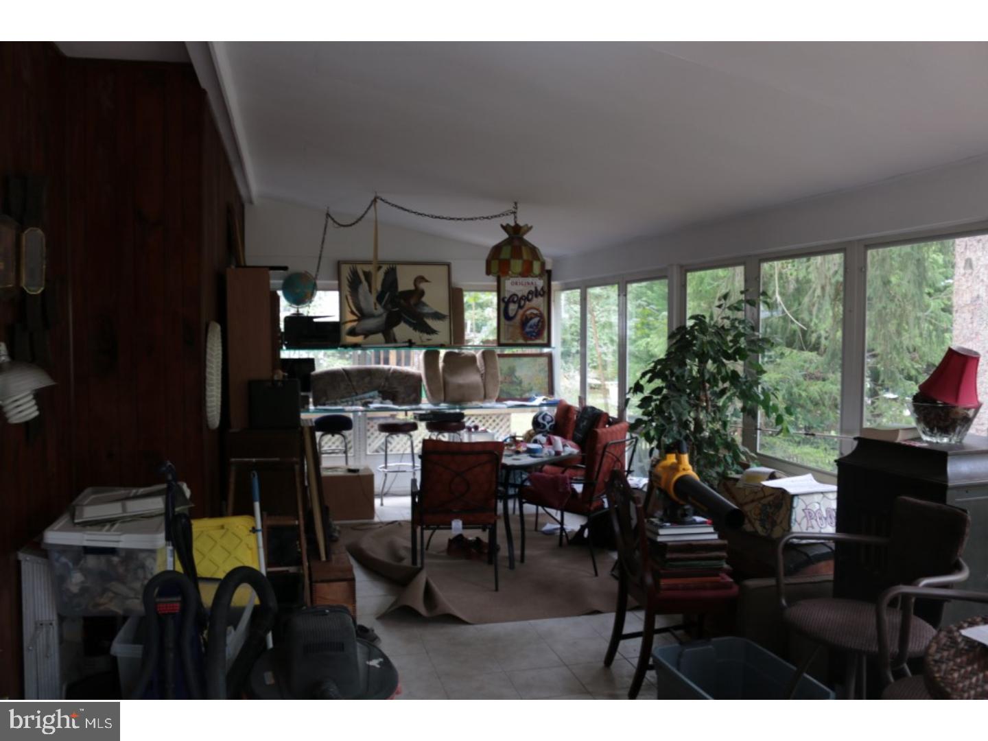 401 Swarthmore Road Glassboro, NJ 08028 - Photo 12 of 20 a view of a dining room with furniture window and outside view