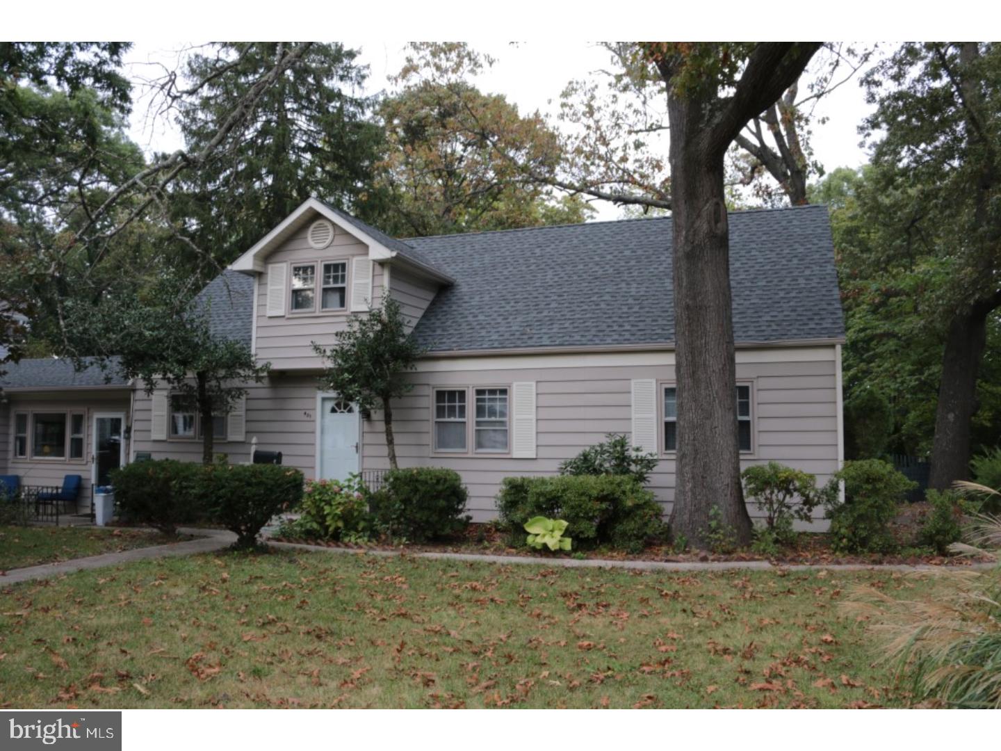 401 Swarthmore Road Glassboro, NJ 08028 - Photo 2 of 20 a front view of a house with a yard and garage
