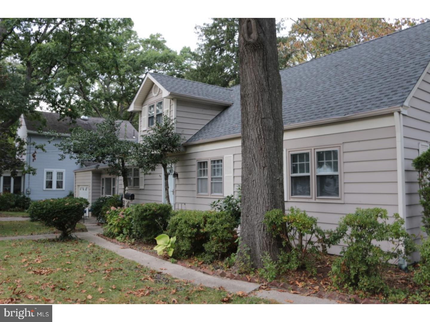 401 Swarthmore Road Glassboro, NJ 08028 - Photo 3 of 20 a house view with a garden space