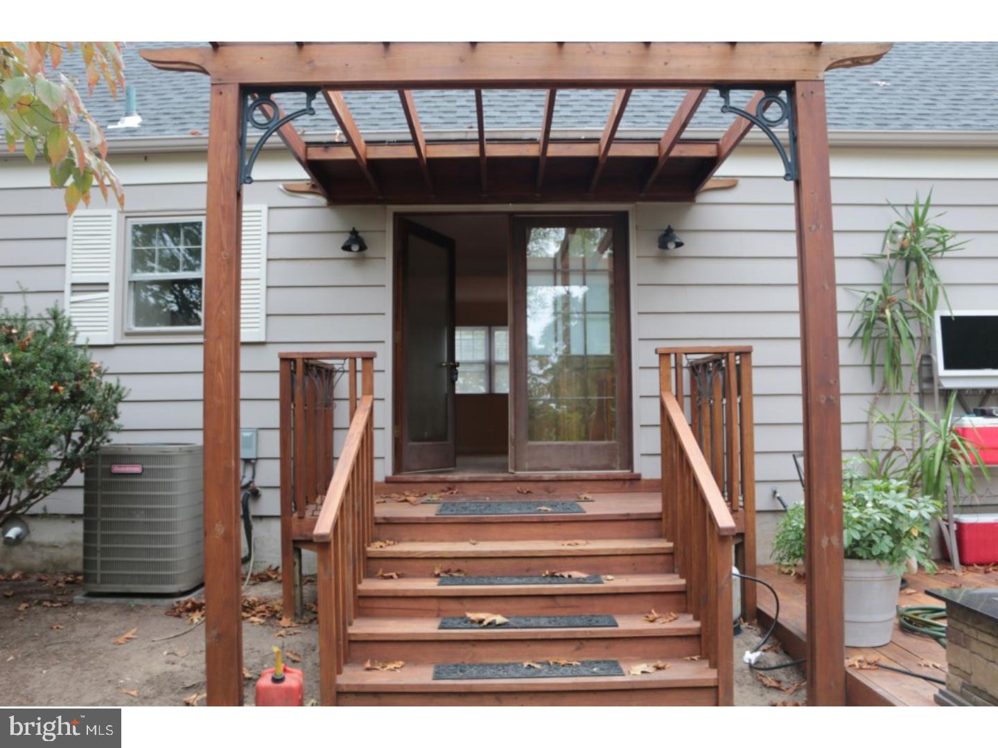 401 Swarthmore Road Glassboro, NJ 08028 - Photo 5 of 20 a front view of a house with entryway and stairs