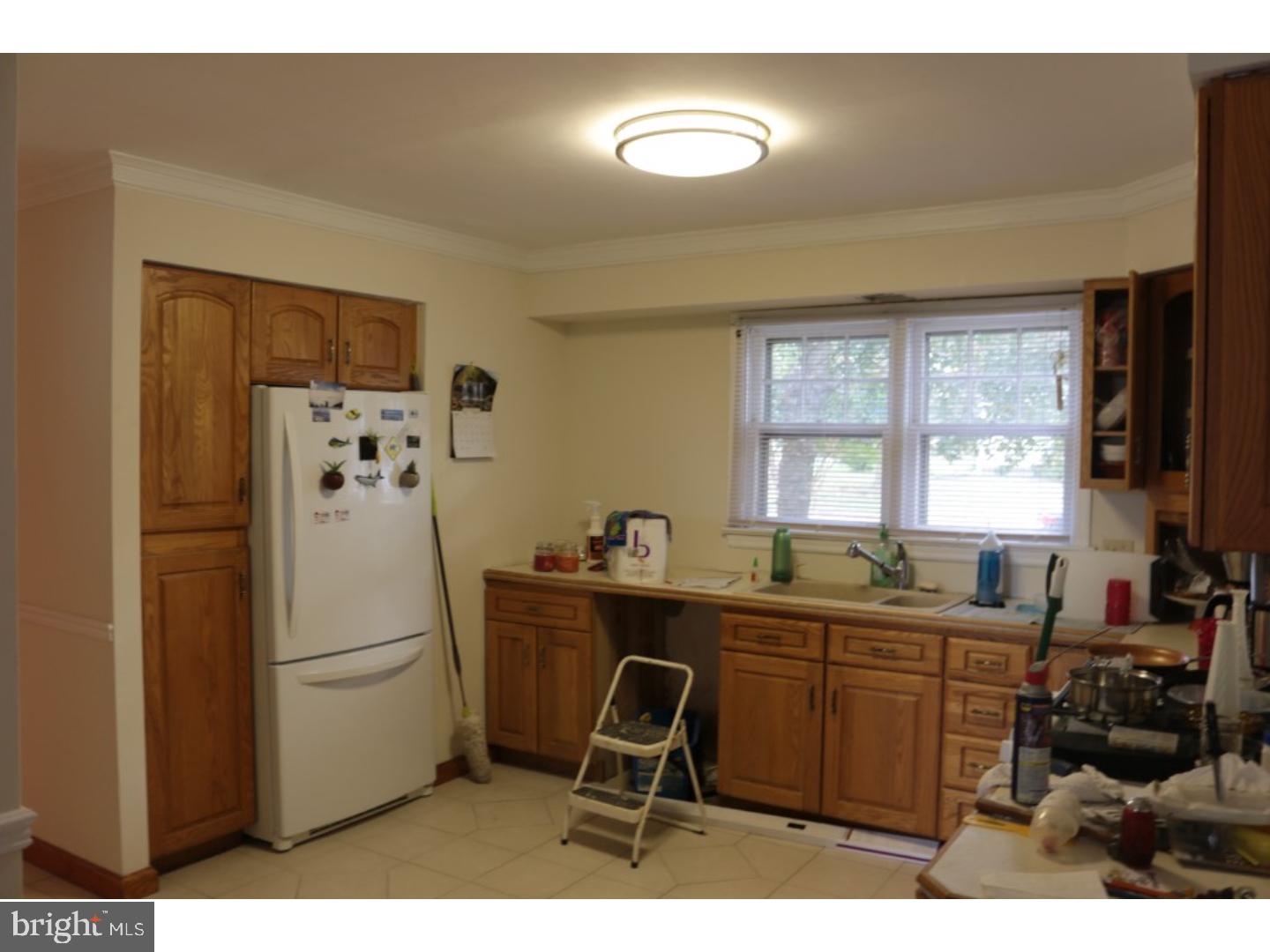 401 Swarthmore Road Glassboro, NJ 08028 - Photo 8 of 20 a workspace with furniture and a window