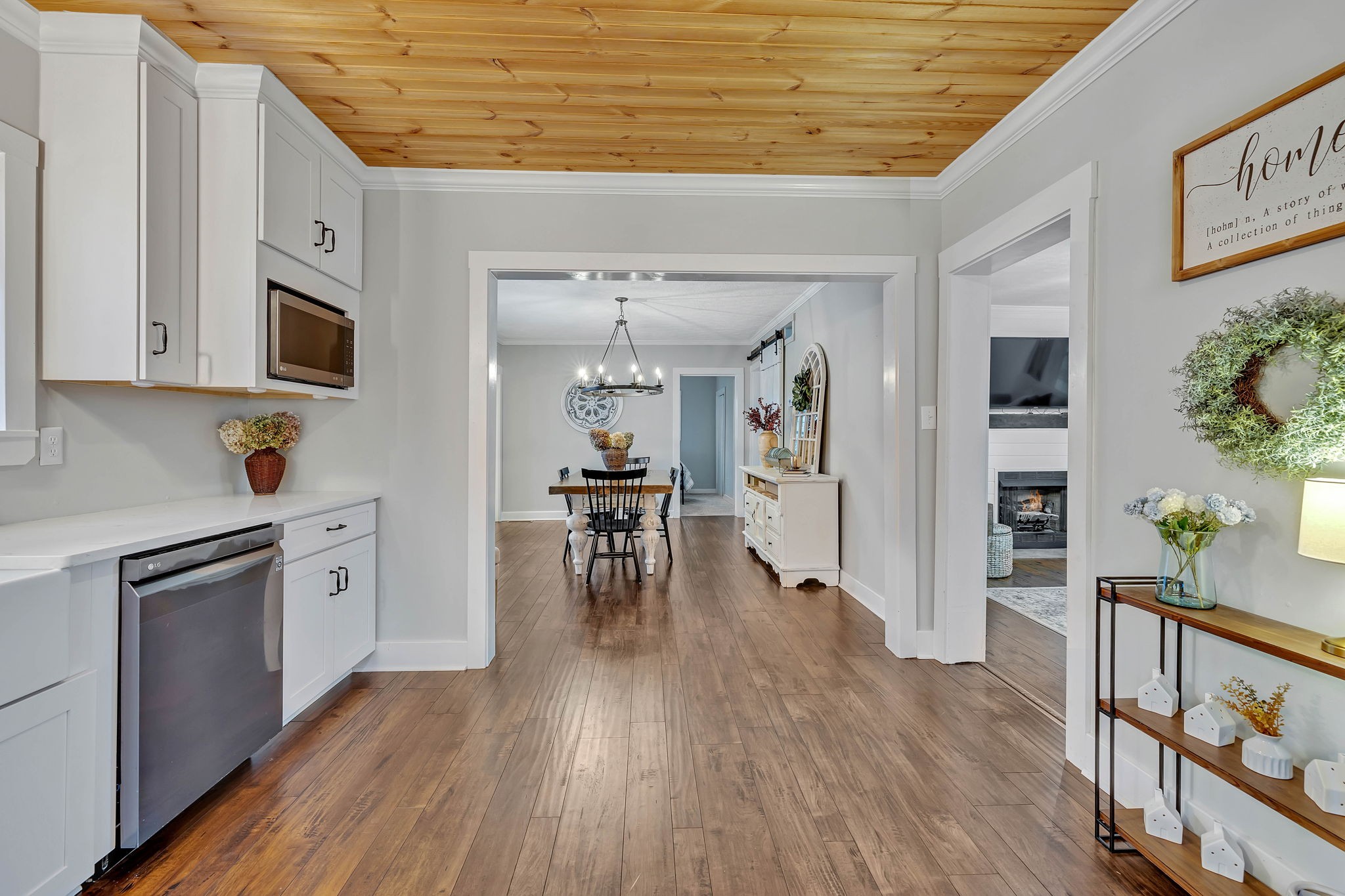 3132 Fishing Ford Road Petersburg, TN 37144 - Photo 17 of 36 a kitchen with white cabinets and stainless steel appliances