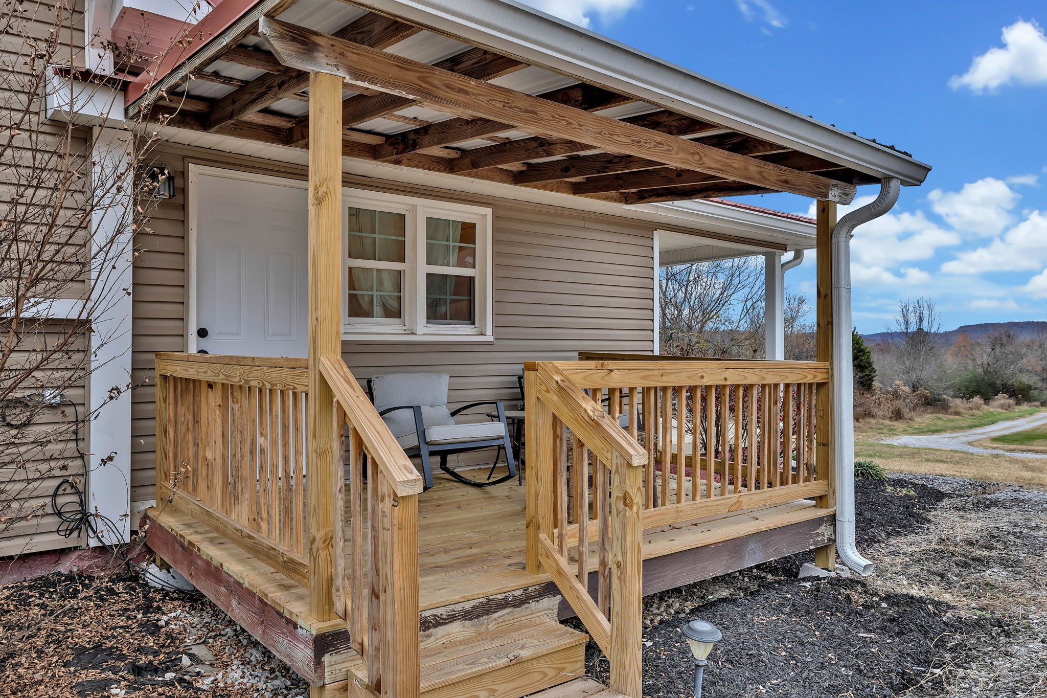 3132 Fishing Ford Road Petersburg, TN 37144 - Photo 34 of 36 a view of a house with a small yard and wooden floor and fence