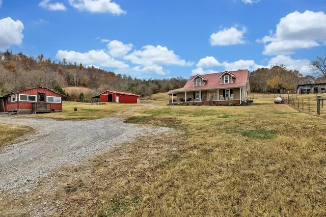 a view of an house with outdoor space and seating area