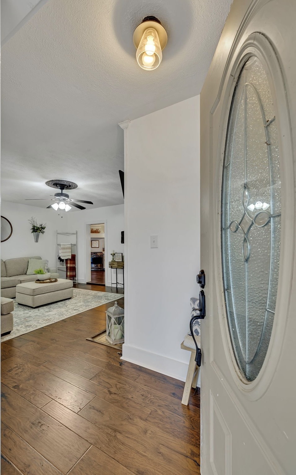 3132 Fishing Ford Road Petersburg, TN 37144 - Photo 7 of 36 a view of a livingroom with furniture wooden floor and a mirror