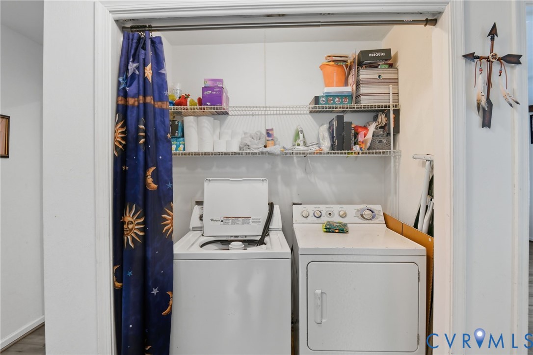 117 Pleasant Spring Avenue Waverly, VA 23890 - Photo 17 of 17 a utility room with washer and dryer