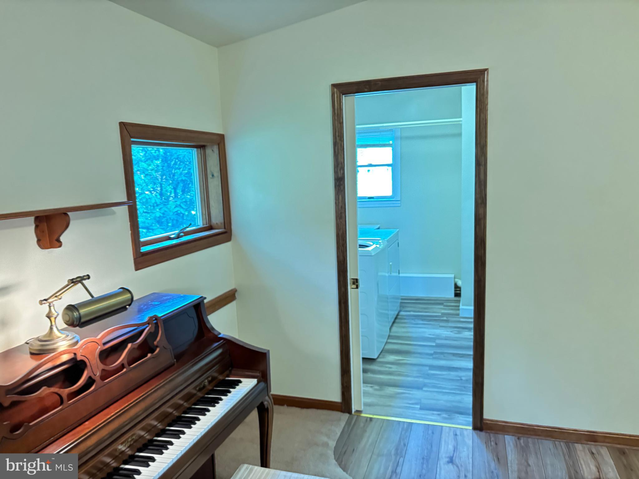 385 Kendig Road Conestoga, PA 17516 - Photo 40 of 101 a room with furniture and wooden floor