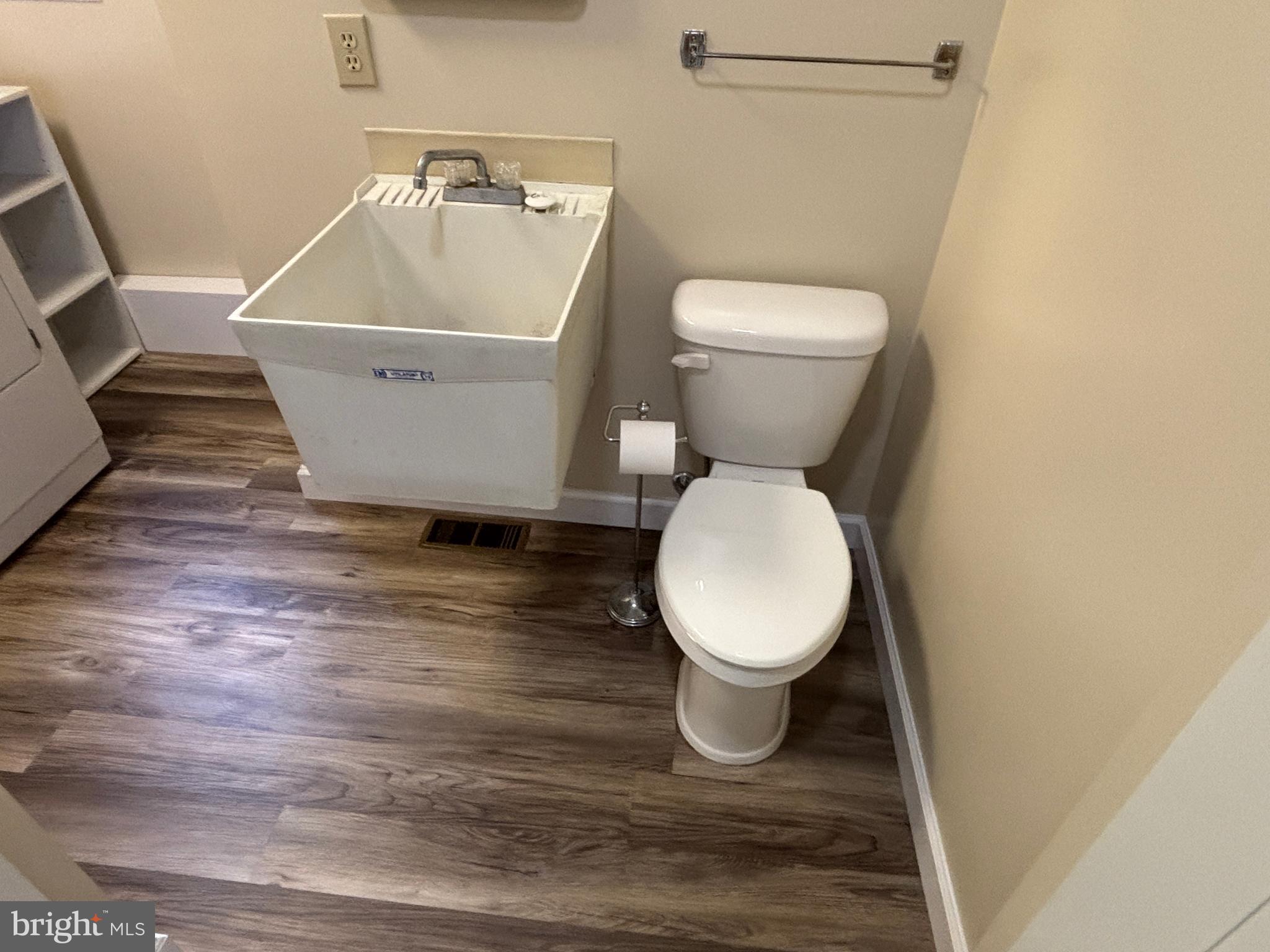 385 Kendig Road Conestoga, PA 17516 - Photo 50 of 101 a white toilet sitting next to a small sink