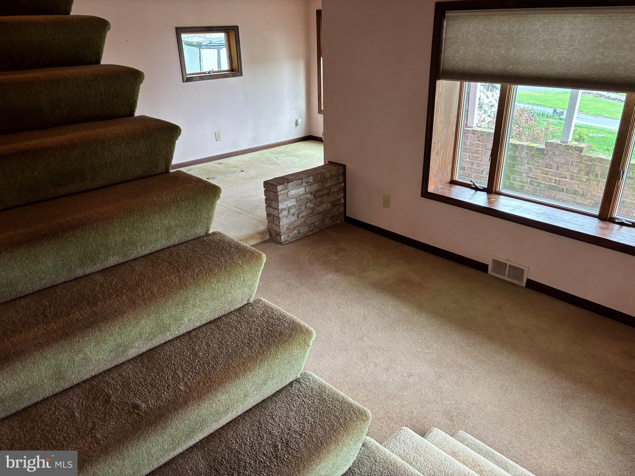 385 Kendig Road Conestoga, PA 17516 - Photo 58 of 101 a living room with furniture and a floor to ceiling window