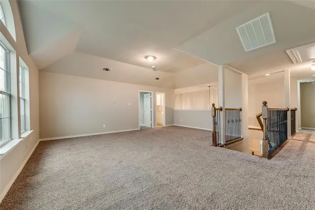 a view of a livingroom with a staircase