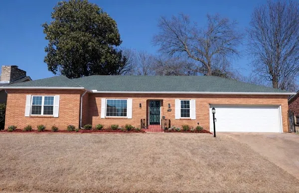 front view of house with a yard