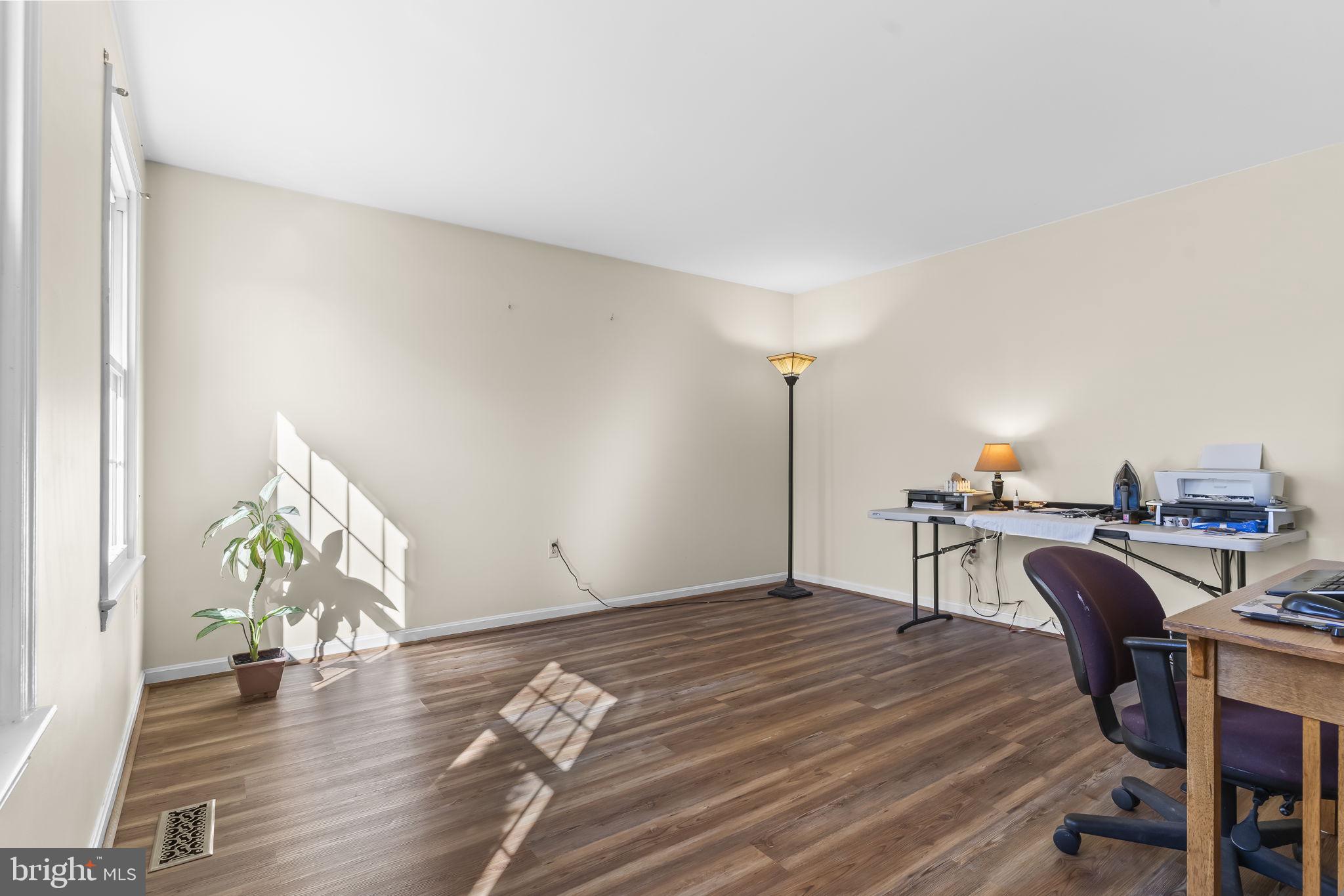 11460 La Plata Road La Plata, MD 20646 - Photo 14 of 51 a workspace with furniture and wooden floor