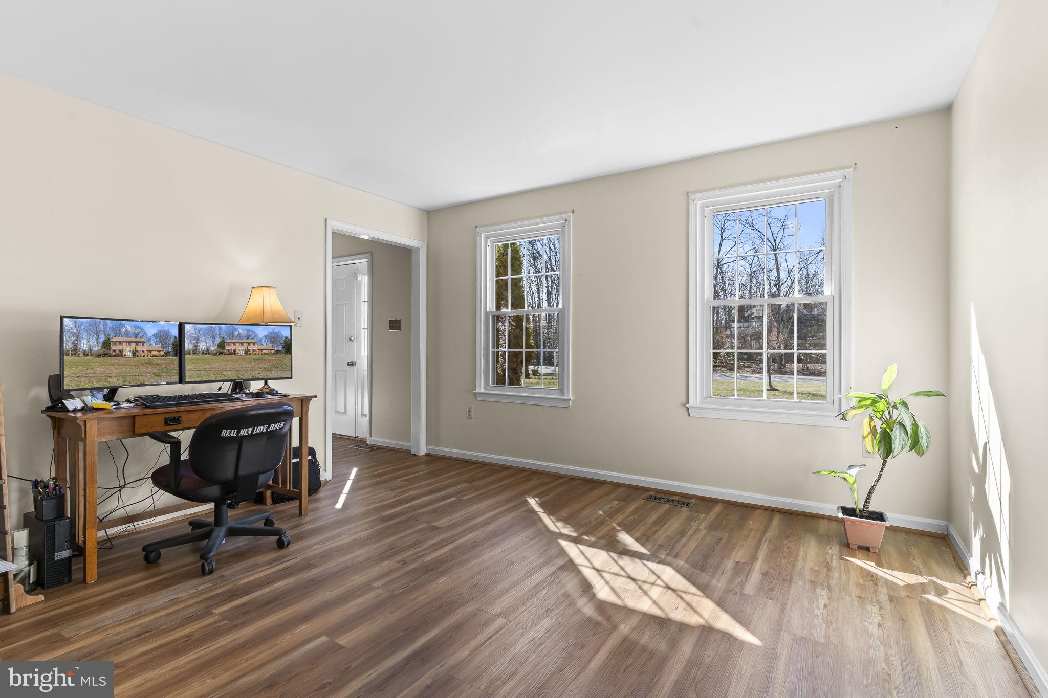 11460 La Plata Road La Plata, MD 20646 - Photo 15 of 51 a view of a workspace with furniture and a window