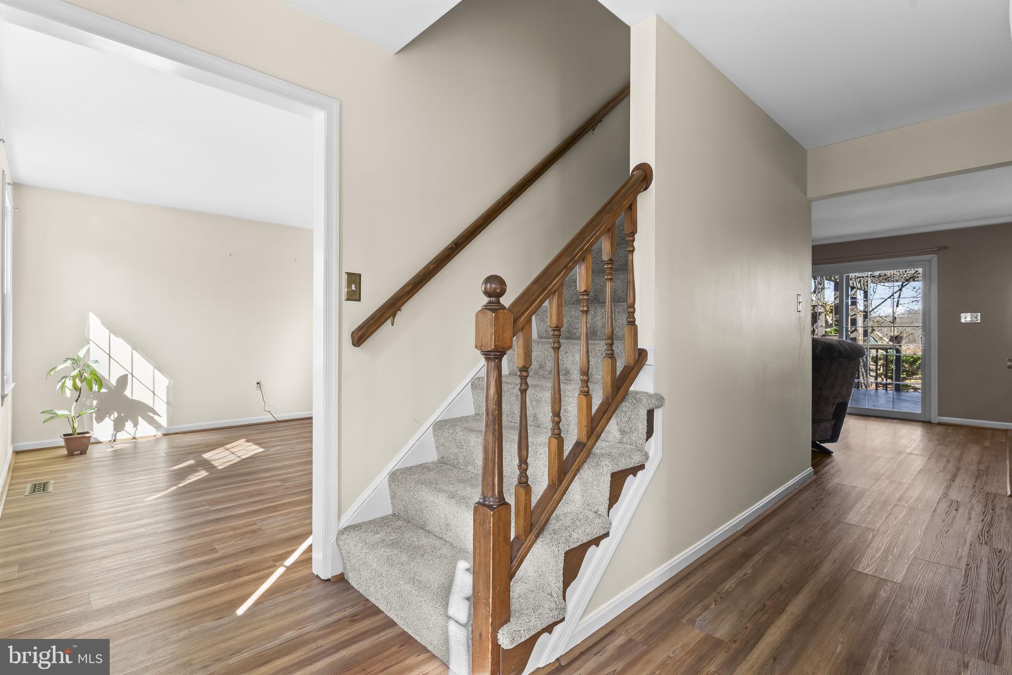 11460 La Plata Road La Plata, MD 20646 - Photo 17 of 51 a view of entryway and hall with wooden floor