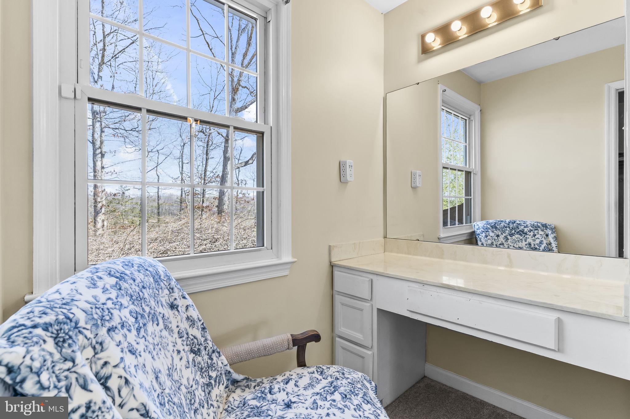 11460 La Plata Road La Plata, MD 20646 - Photo 21 of 51 a bathroom with a sink and a mirror