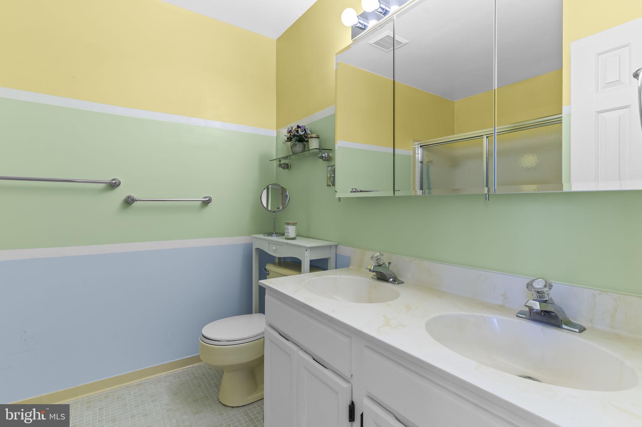 11460 La Plata Road La Plata, MD 20646 - Photo 22 of 51 a bathroom with a sink and a toilet