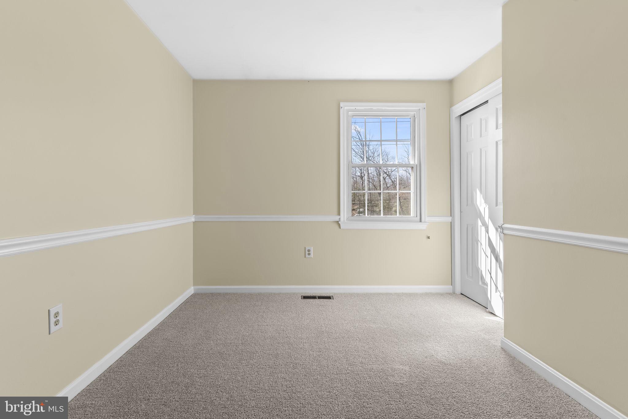 11460 La Plata Road La Plata, MD 20646 - Photo 23 of 51 a view of an empty room with a window