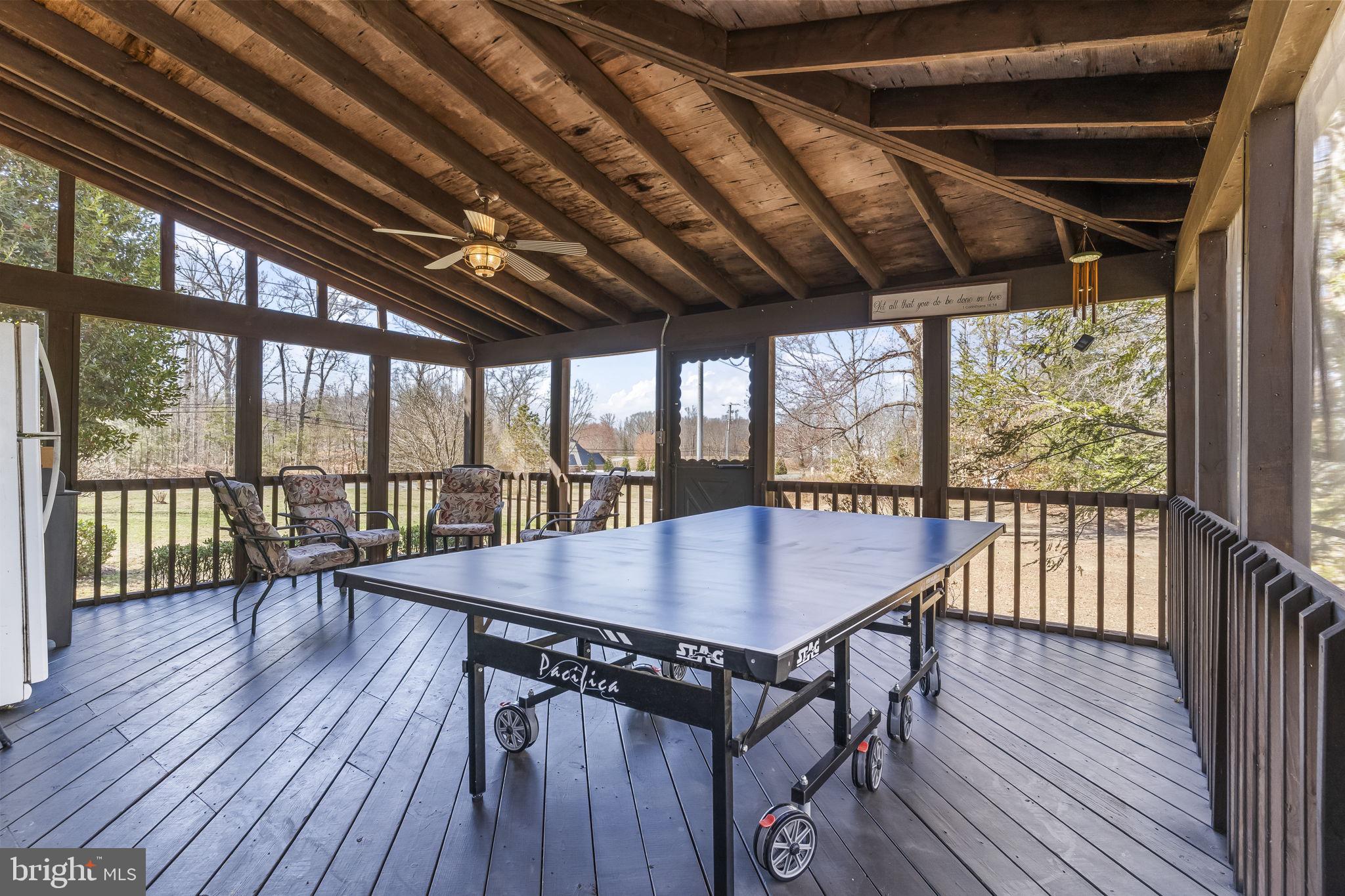 11460 La Plata Road La Plata, MD 20646 - Photo 35 of 51 a dining room with wooden floor glass top table and chairs