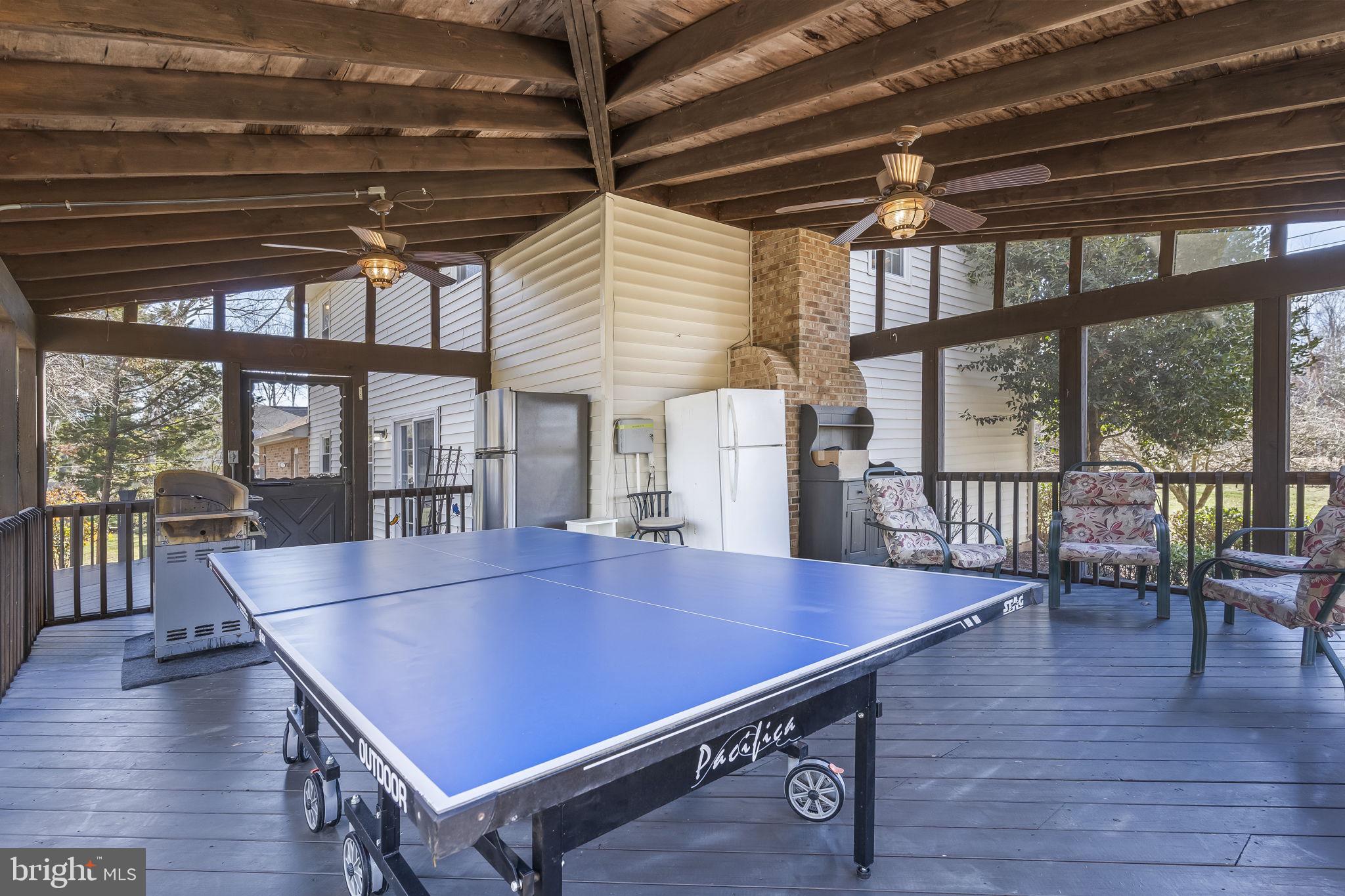 11460 La Plata Road La Plata, MD 20646 - Photo 36 of 51 a dining room with wooden floor windows and a table