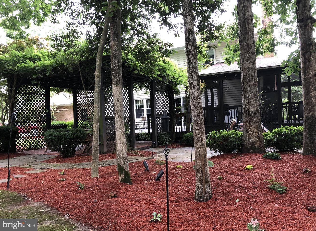 11460 La Plata Road La Plata, MD 20646 - Photo 38 of 51 a view of a house with backyard and tree