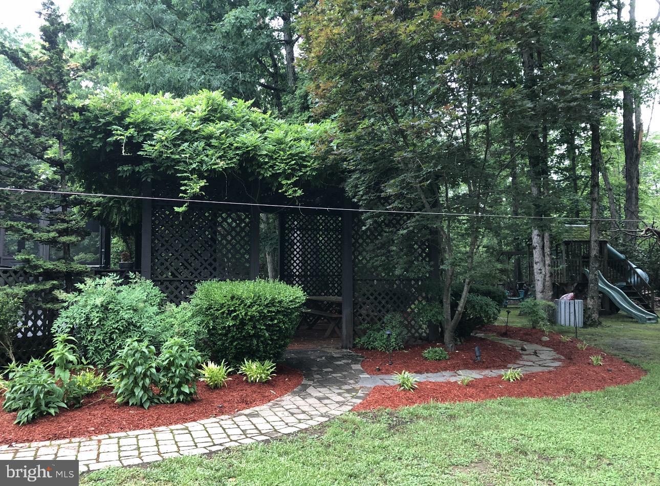 11460 La Plata Road La Plata, MD 20646 - Photo 42 of 51 a backyard of a house with lots of green space