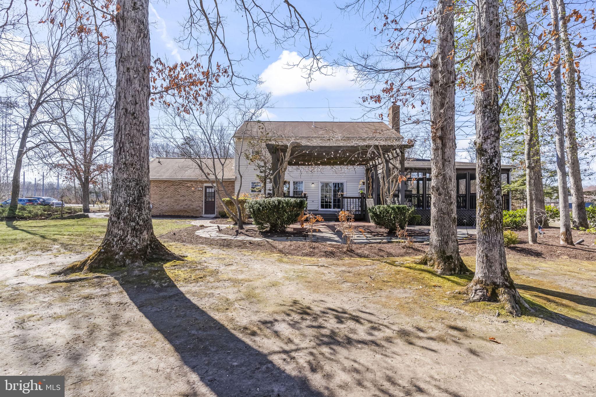 11460 La Plata Road La Plata, MD 20646 - Photo 44 of 51 a view of a house with backyard porch and sitting area