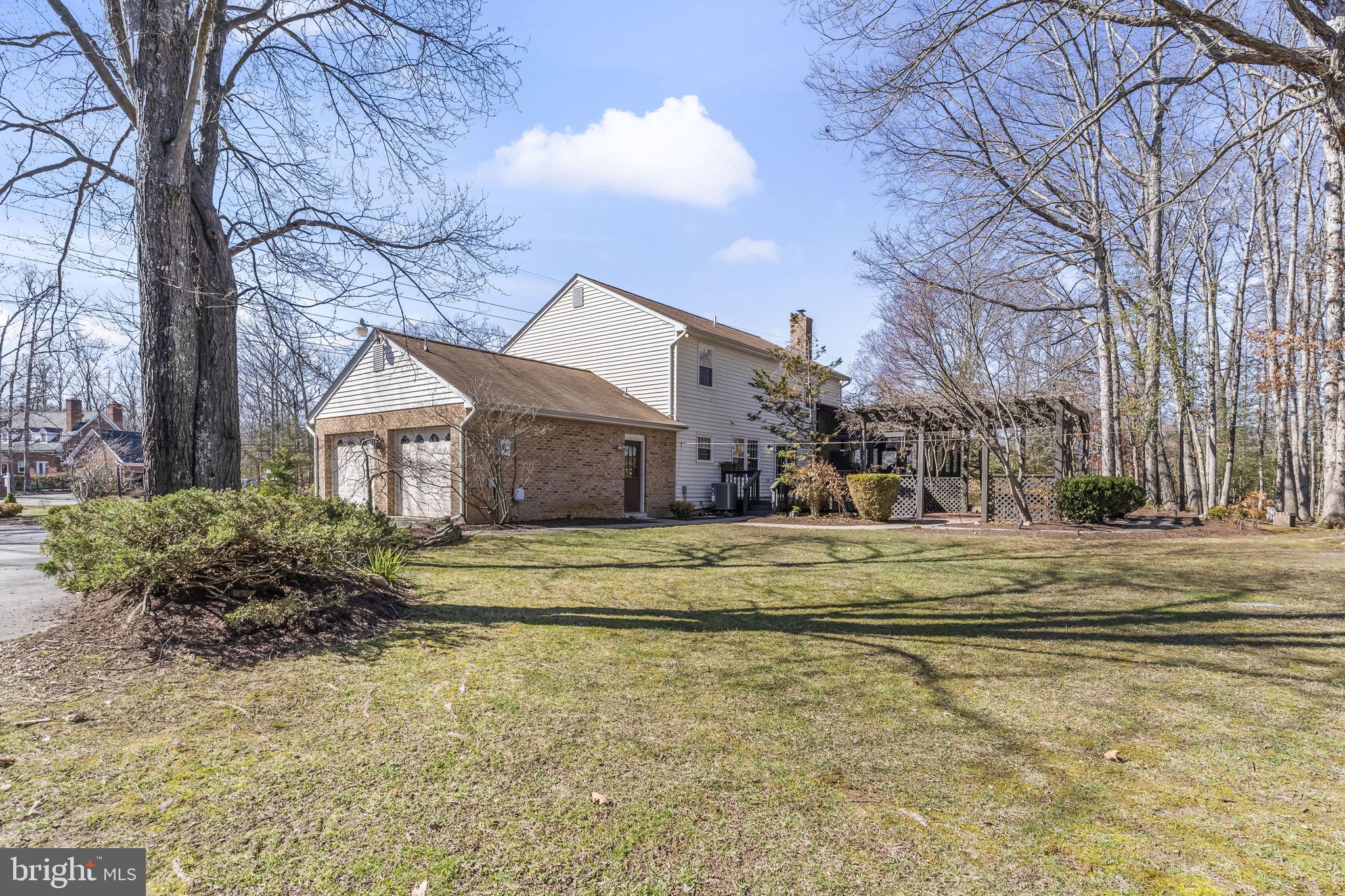 11460 La Plata Road La Plata, MD 20646 - Photo 45 of 51 a front view of a house with a yard
