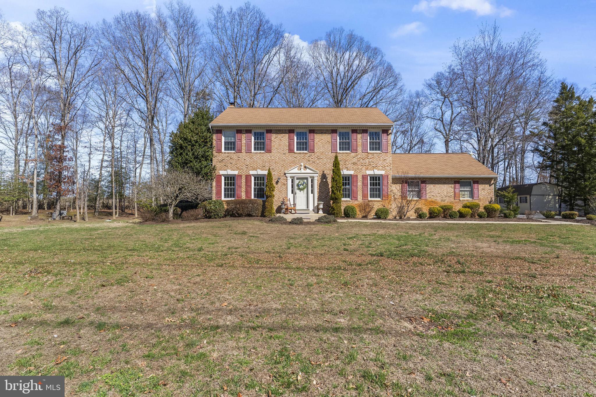 11460 La Plata Road La Plata, MD 20646 - Photo 49 of 51 a front view of a house with a yard
