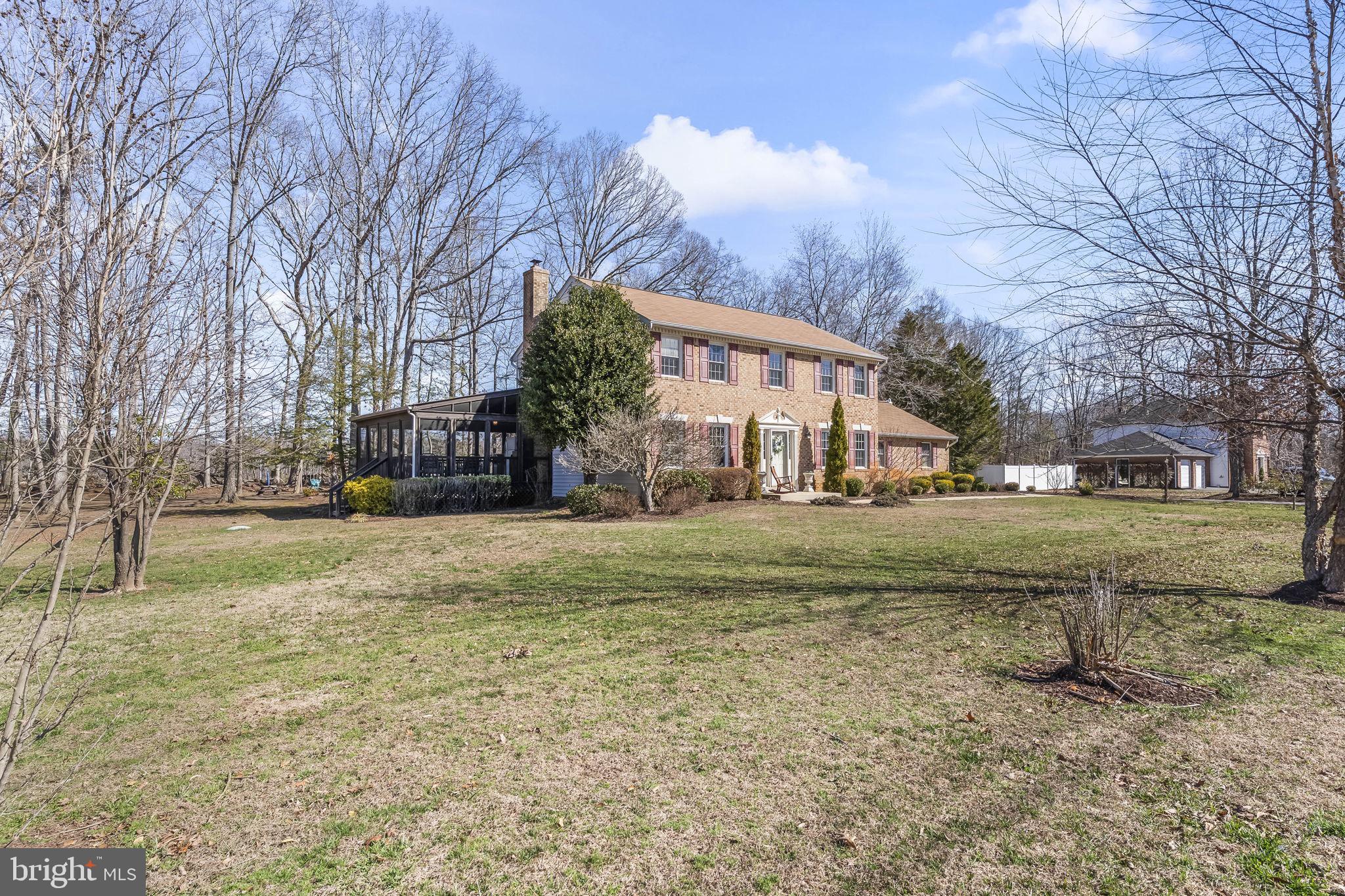 11460 La Plata Road La Plata, MD 20646 - Photo 50 of 51 a view of a yard with a house in the background