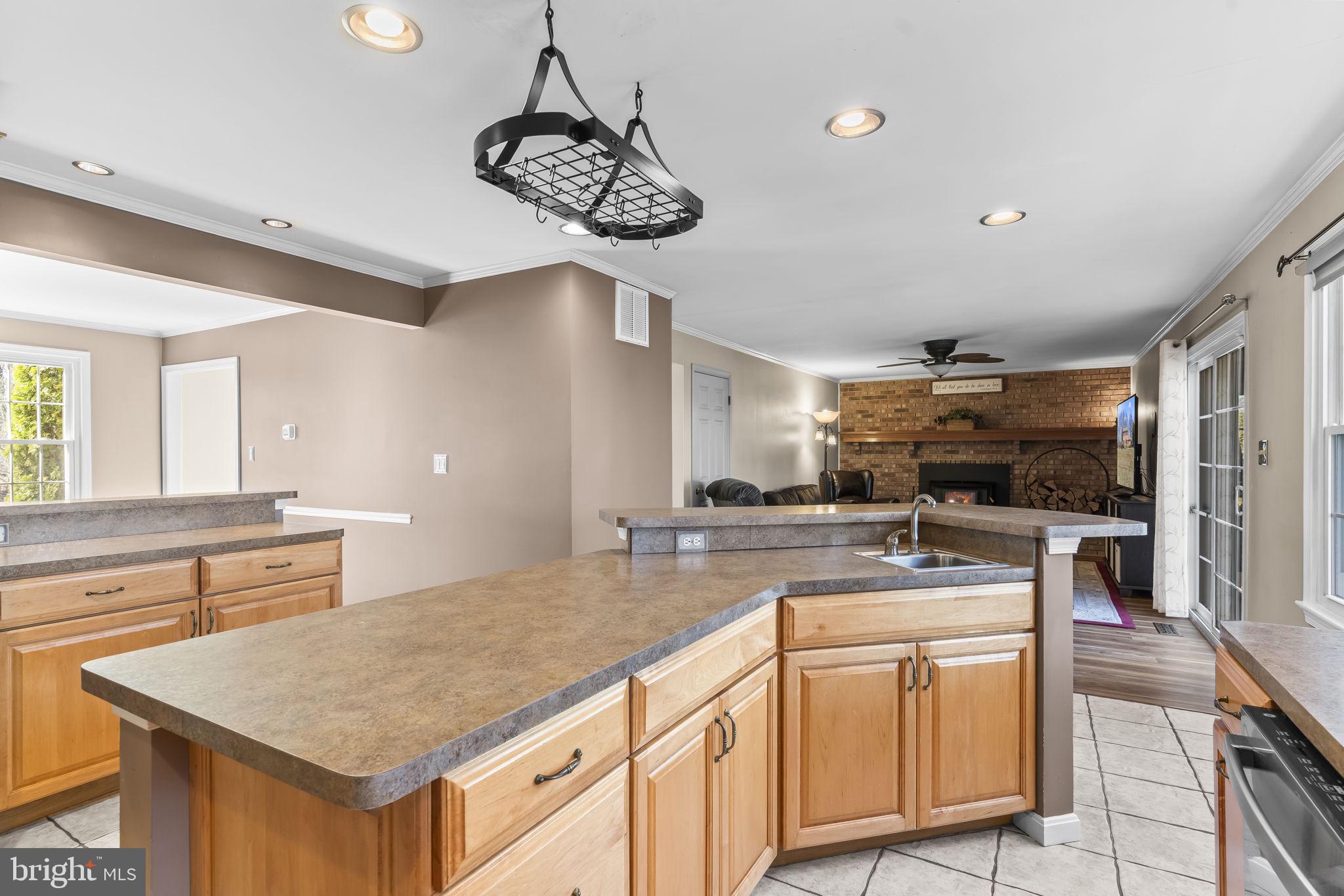 11460 La Plata Road La Plata, MD 20646 - Photo 8 of 51 a kitchen with stainless steel appliances granite countertop a sink a stove counter space and cabinets
