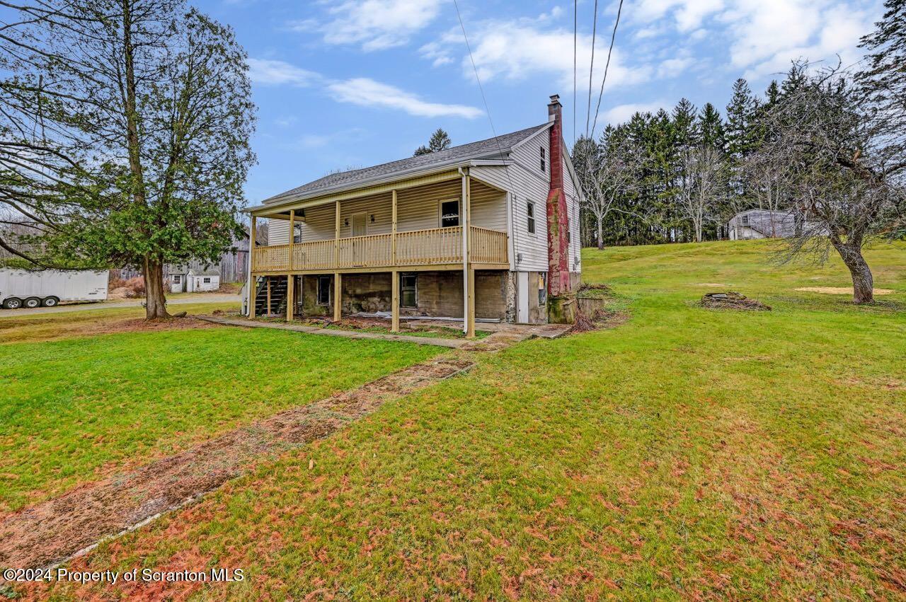 1047 Drinker Turnpike Moscow, PA 18444 - Photo 1 of 55 a view of a house with a yard