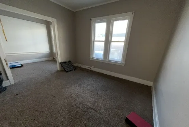 a view of a room with a window