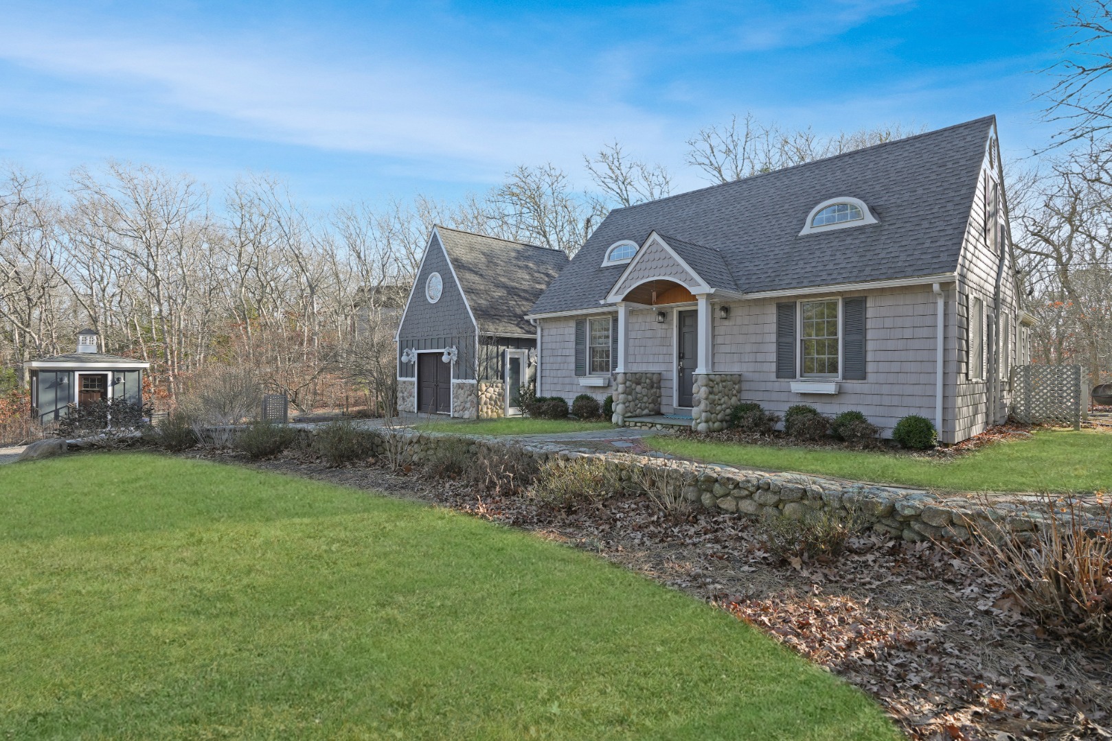 26 Sea Glen Road Oak Bluffs, MA 02557 - Photo 1 of 36 a front view of a house with a yard