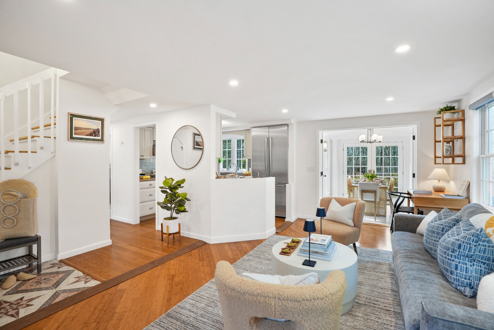 26 Sea Glen Road Oak Bluffs, MA 02557 - Photo 4 of 36 a living room with furniture and a table