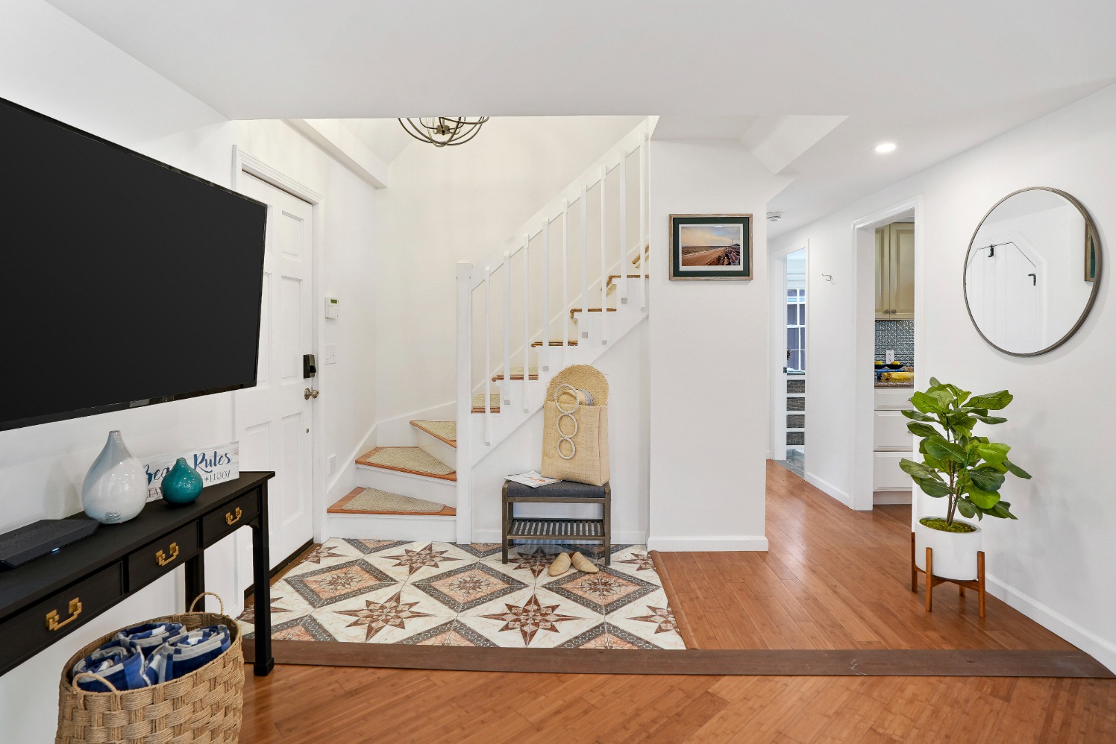 26 Sea Glen Road Oak Bluffs, MA 02557 - Photo 7 of 36 a living room with furniture and a flat screen tv