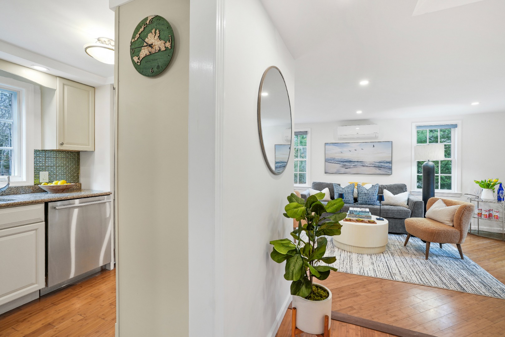 26 Sea Glen Road Oak Bluffs, MA 02557 - Photo 8 of 36 a living room with furniture floor to ceiling window and wooden floor