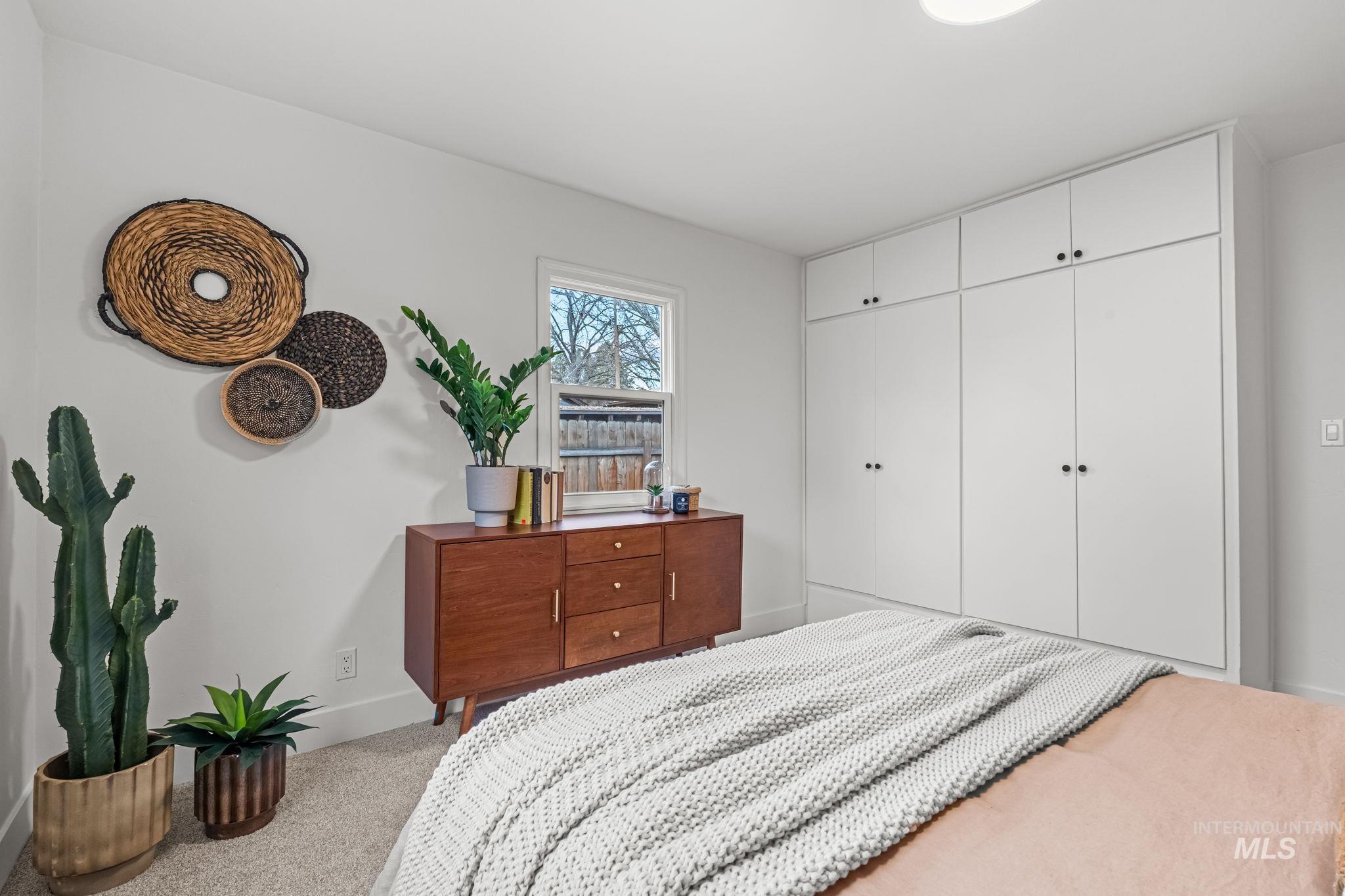 5420 Anna Street Boise, ID 83705 - Photo 17 of 24 Bedroom with a closet and carpet flooring