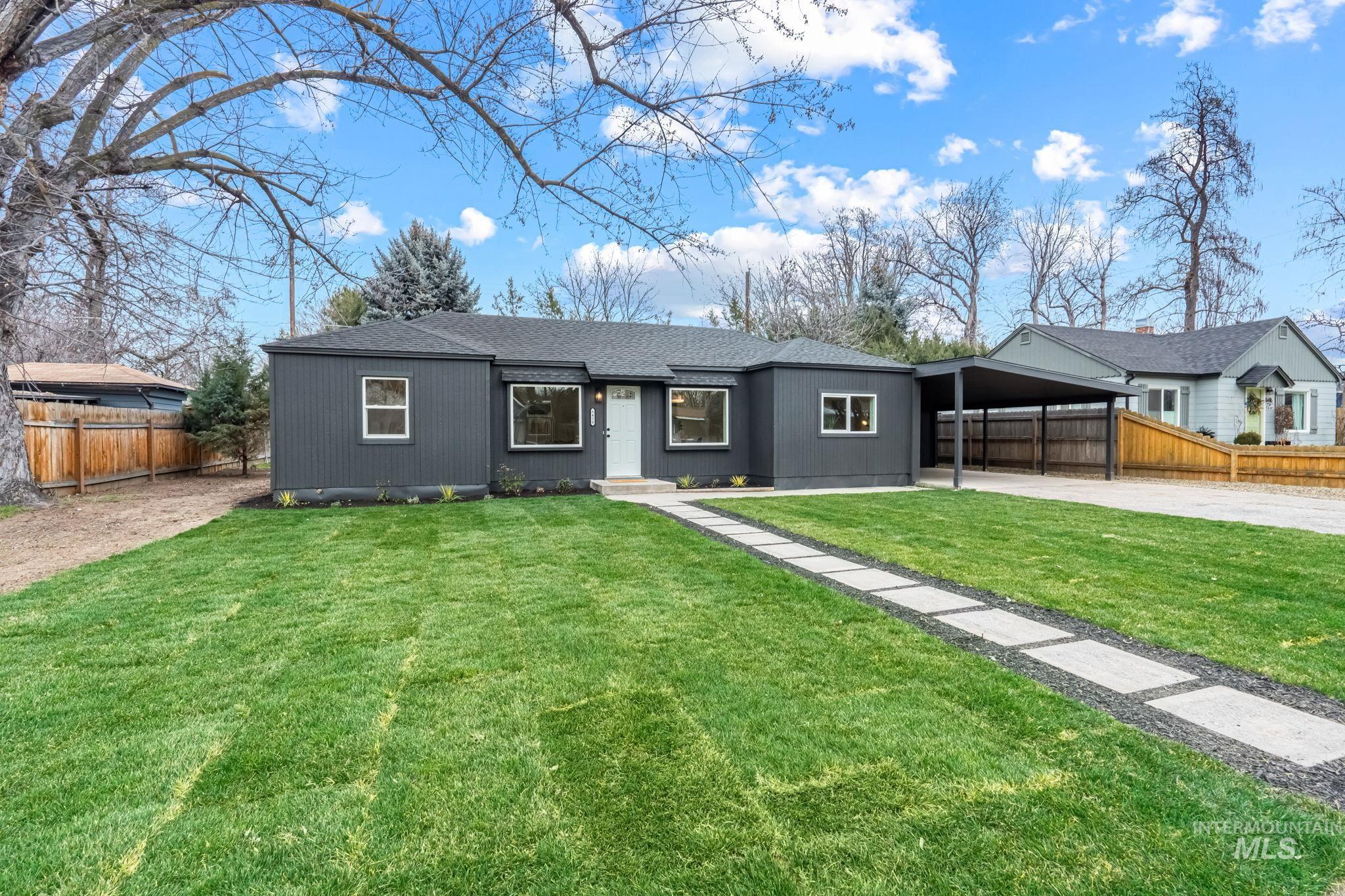 5420 Anna Street Boise, ID 83705 - Photo 2 of 24 Ranch-style home with roof with shingles, concrete driveway, and an attached carport