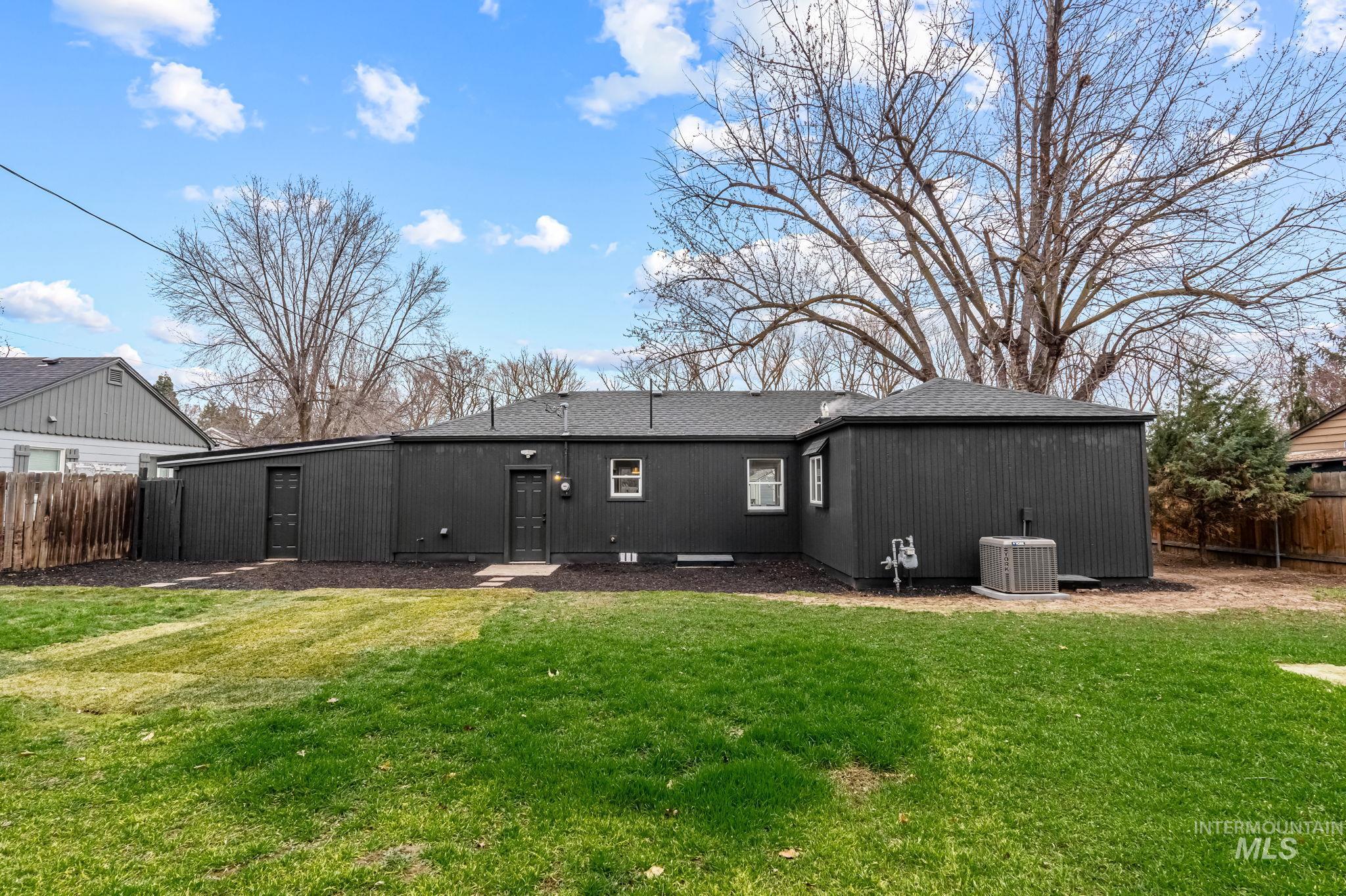 5420 Anna Street Boise, ID 83705 - Photo 23 of 24 Rear view of property featuring a shingled roof