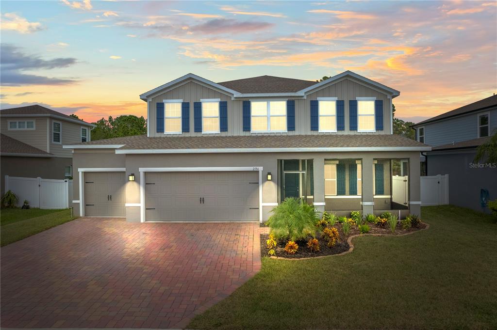 2186 Swinstead Drive Sanford, FL 32773 - Photo 1 of 1 a front view of a house with garden