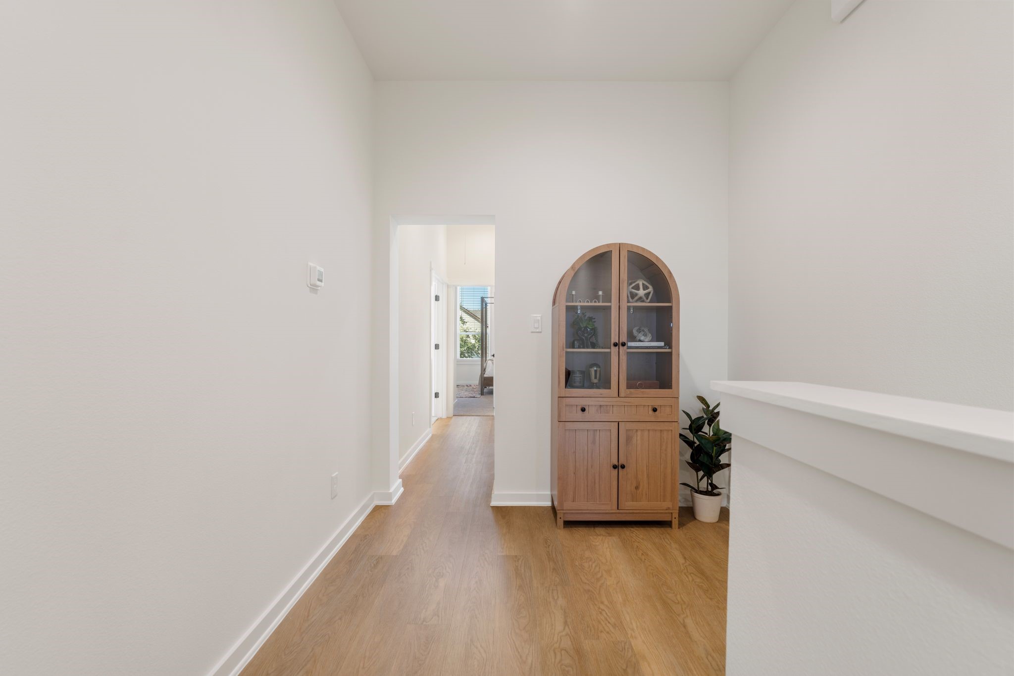 1215 Sampson Street Houston, TX 77003 - Photo 23 of 35 Second-floor landing offers a versatile space perfect for a home office or study area.